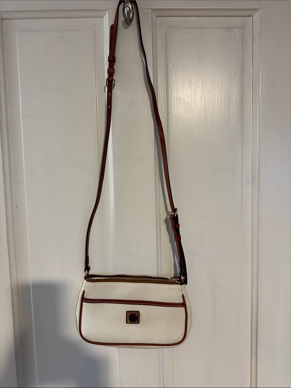 Dooney & Bourke White Pebbled Leather Crossbody with Brown Trim